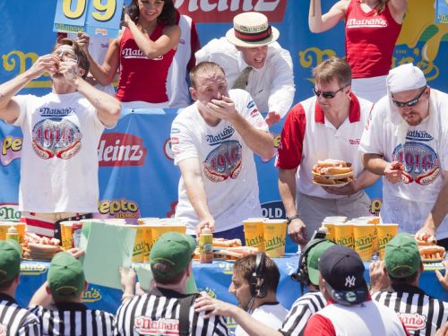 see-the-professional-eaters-chow-down-at-nathans-hot-dog-eating-contest-at-brooklyns-coney-island-on-july-4th